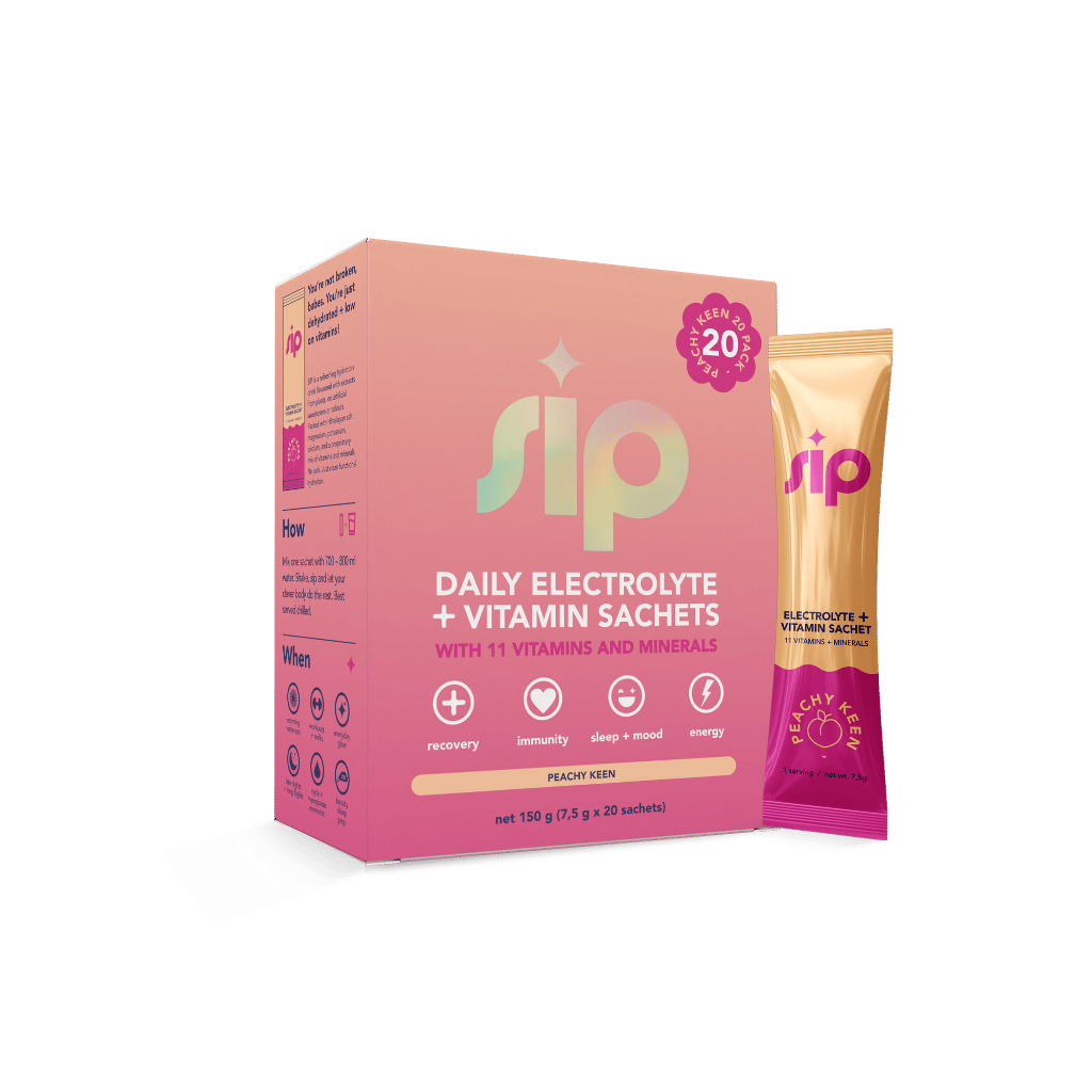 Sip Daily Electrolyte + Vitamin Sachets packaging and a single sachet on a green background