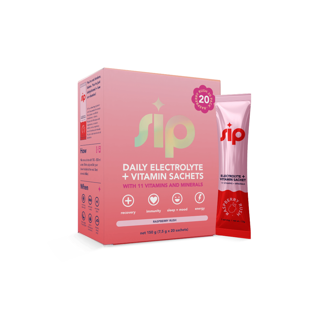 Sip Daily Electrolyte + Vitamin Sachets packaging and a single sachet on a green background