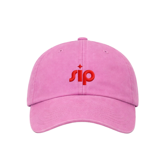 Pink cap with 'sip' logo on a white background